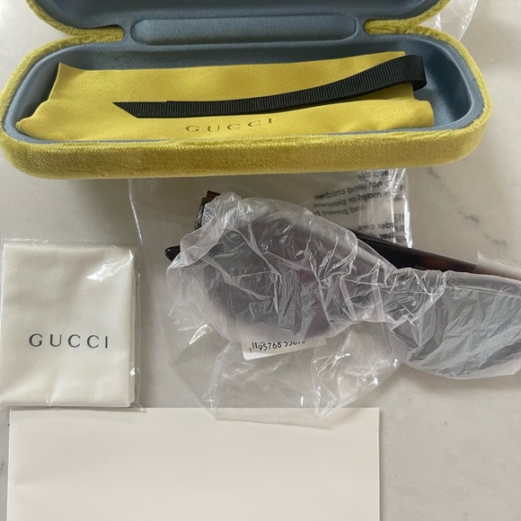 GUCCI GREY TRANSPARENT FRAMES WITH GUCCI COLORS ON ARMS WITH GREY MIRROR LENSES - Picture 16 of 16